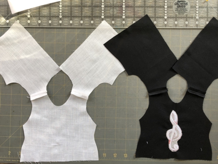 Lining and bodice pieces connected on shoulders.