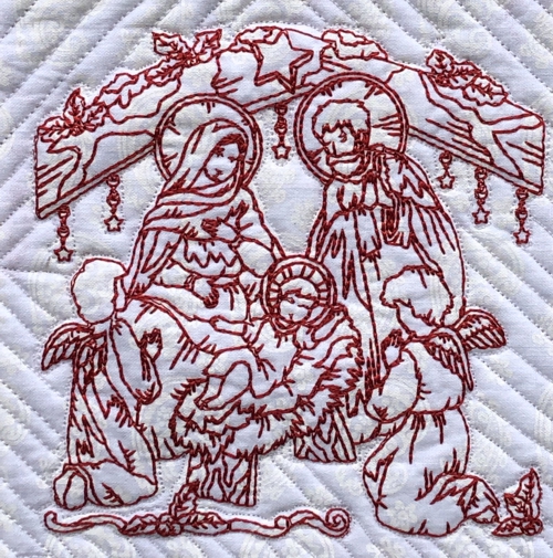 Stitch-out of one of the designs with Nativity scene