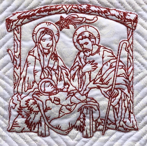 Stitch-out of one of the designs with Nativity scene.