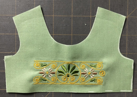 Bodice front piece with embroidery.