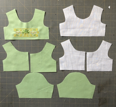 Parts of bodice, bodice lining and sleeves.