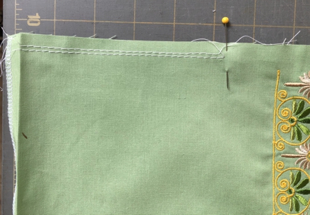 Sew 2 rows of gathering stitches between the dots