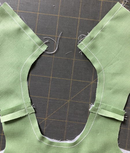 Stitch along the back and neckline.