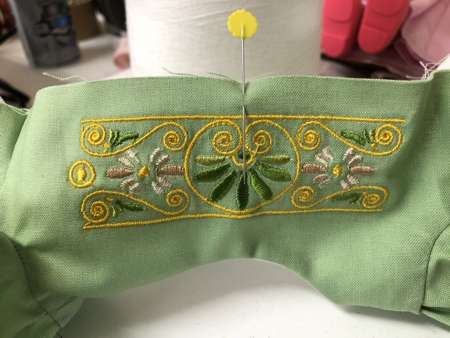 With a pin mark the center of the bodice front.