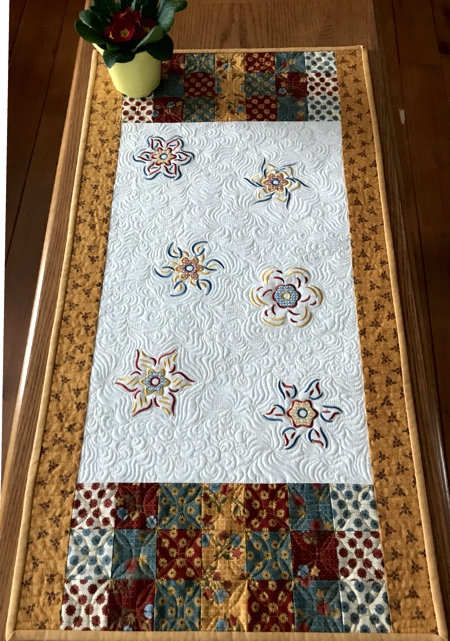 Rustic style quilted tablerunner with embroidery