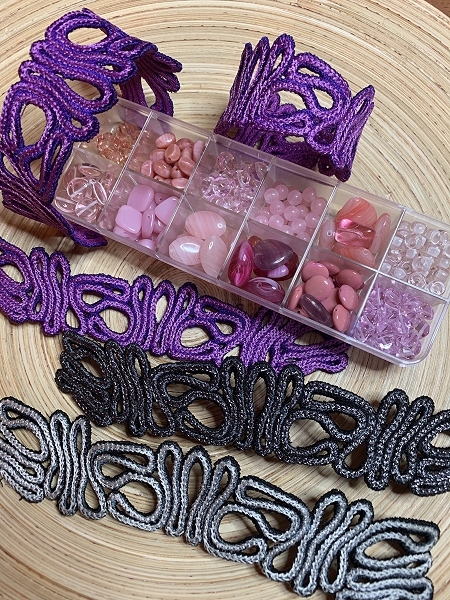 Several stitch-outs of the bracelet and different beads.