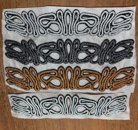 Bracelet stitch-outs on the watersoluble mesh stabilizer.
