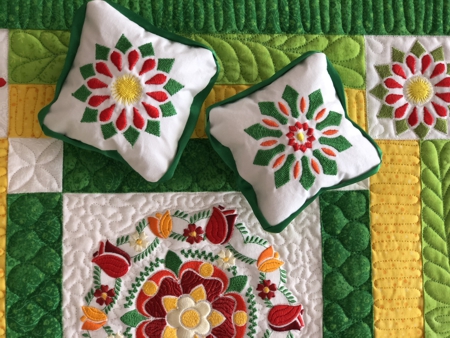 Close-up of the pillows with embroidery.