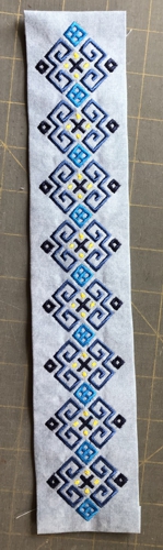Embroidered placket, right side.