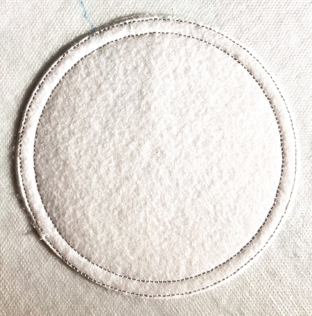 Cut away the felt around the circle.