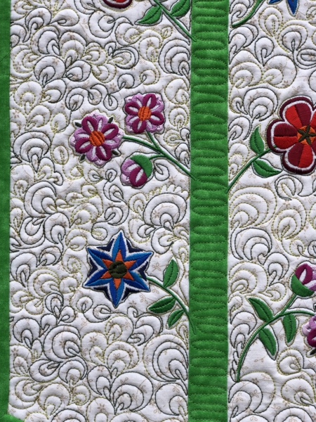 Close-up of the embroidery on the finished wallhanging
