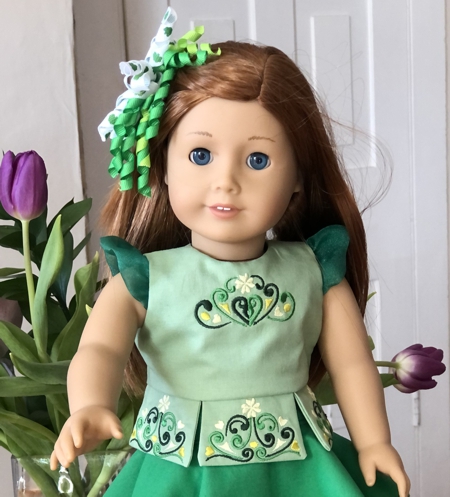 Finished top on a doll.