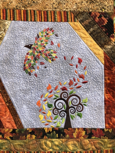 Close-up of the quilting and embroidery.