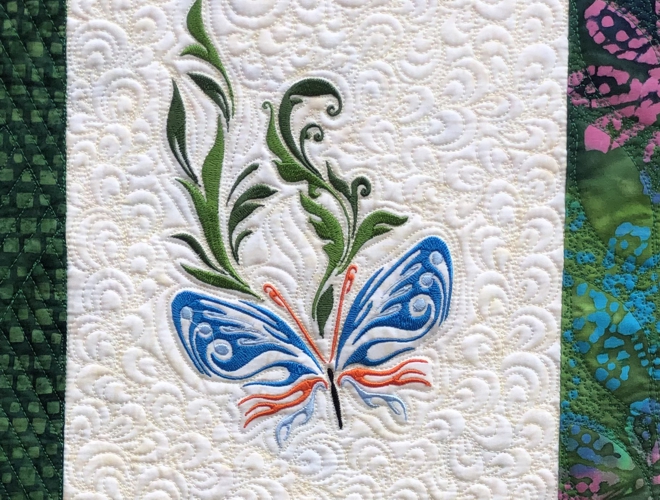 Close-up of the butterfly embroidery