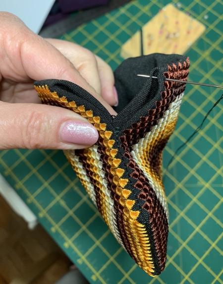 Stitch the open seams by hand.