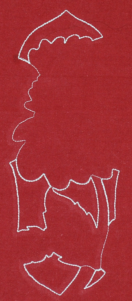 The stitch-out of the outline of the design.
