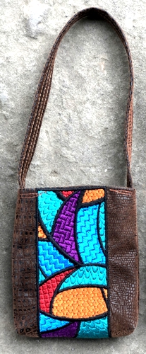 Finished bag made with the stained glass bookmark embroidery.