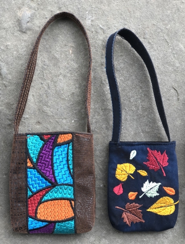 2 bags - one with the autumn leaves stitch-out, the second one with the stained glass bookmark stitch-out.