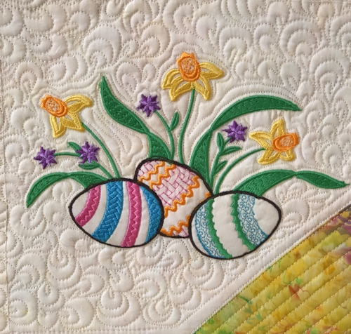 Close-up of one of the embroidered blocks.