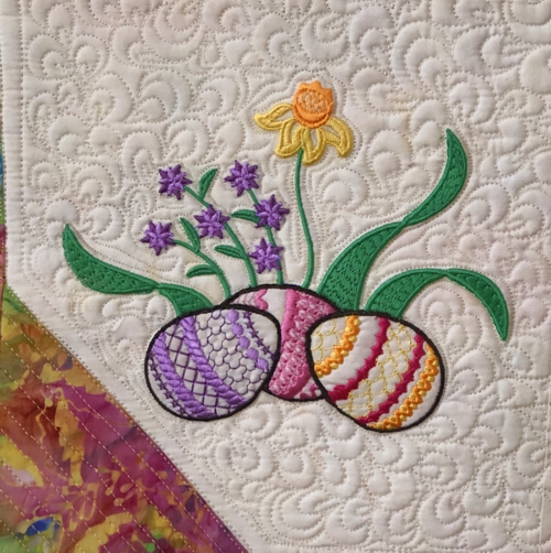 Close-up of one of the embroidered blocks.