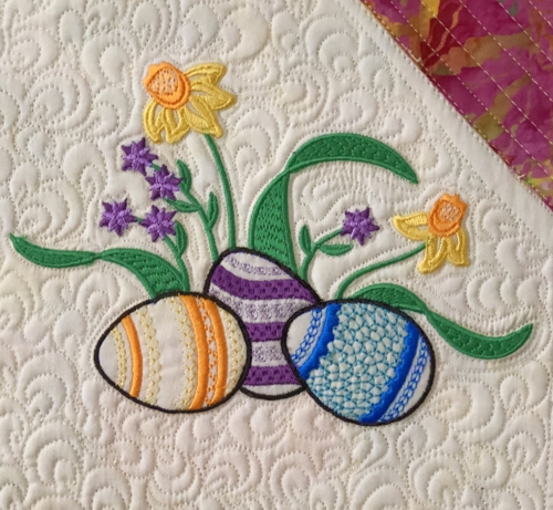 Close-up of one of the embroidered blocks.