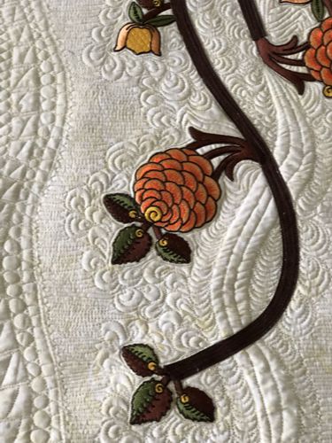 Close-up of the quilting and embroidery.