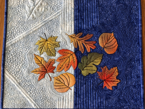 Close-up of the quilting and embroidery.