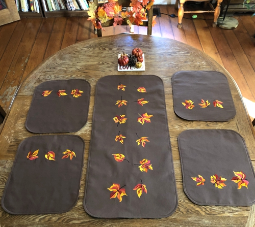 Finished table set with autumn leaves embroidery