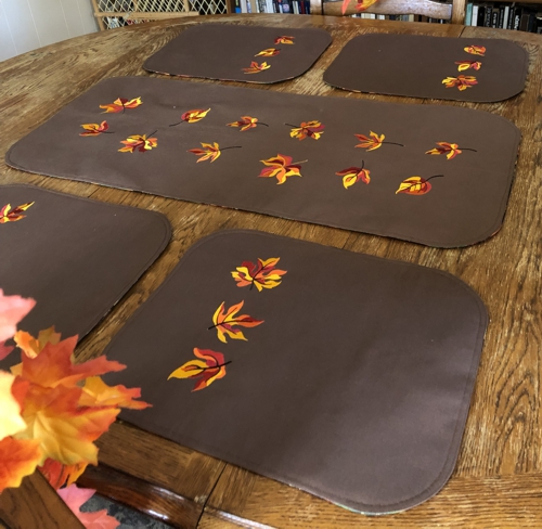 Finished table set with autumn leaves embroidery