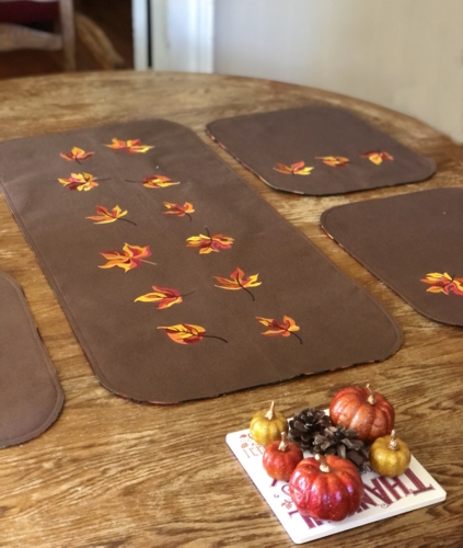 Finished table set with autumn leaves embroidery