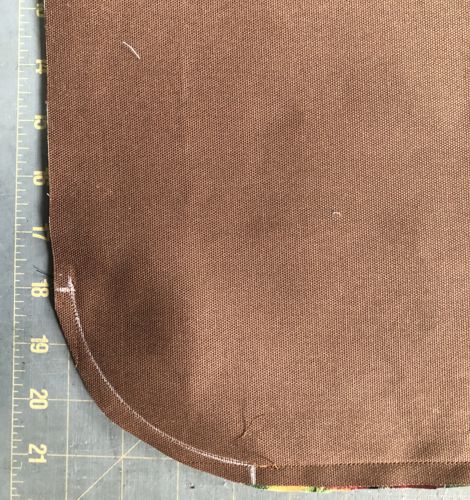Cut away the corners along the arcs with seam allowance slightly more than 1/4".