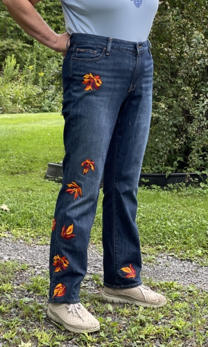 Jeans embellished with leaves embroidery