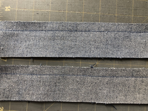 The handles strips sewn together along one side.