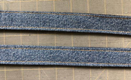 Long sides of the handles topstitched.