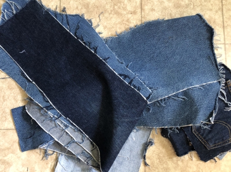 Pieces of cut old jeans