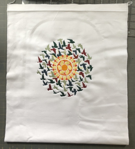 Embroidery on white canvas