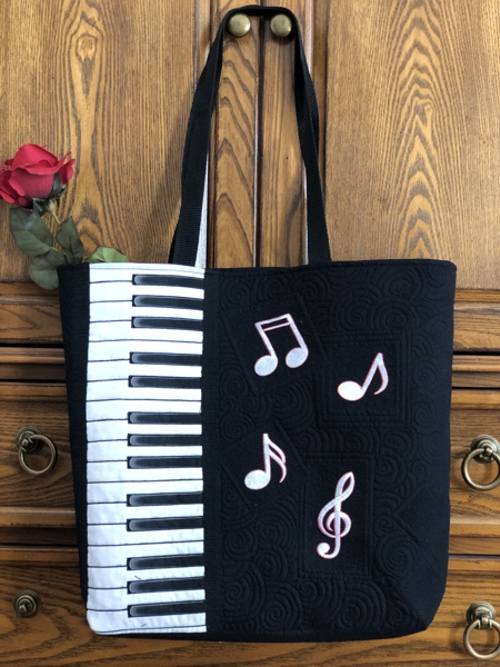 Finished tote bag - black with white misuc notes embroidery and piano keybord pattern