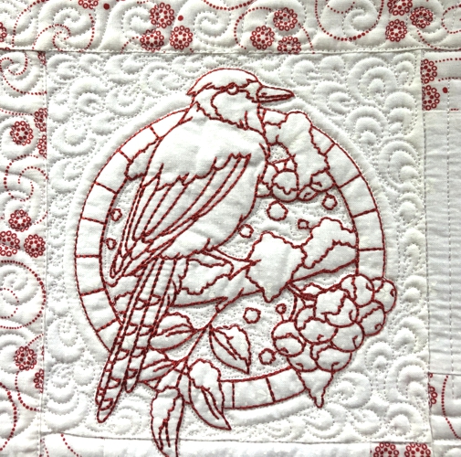 Close-up of the quilting and embroidery.