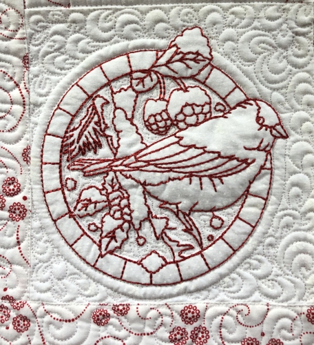 Close-up of the quilting and embroidery.