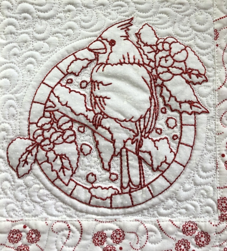 Close-up of the quilting and embroidery.