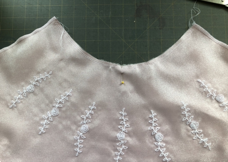 Finish the raw edges of the skirt and overlay together.