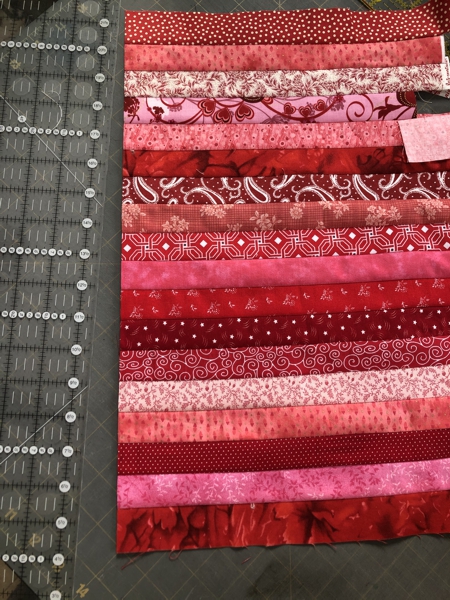 Strips of different fabrics sewn together lengthwise.