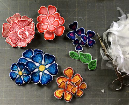 The stitch-outs of the flowers cut out.