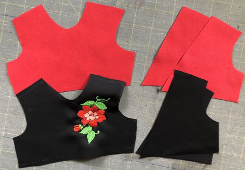 Pieces of the bodice - top and lining fabrics.