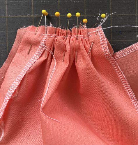 Photo showing how to pin the skirt front part to the bodice