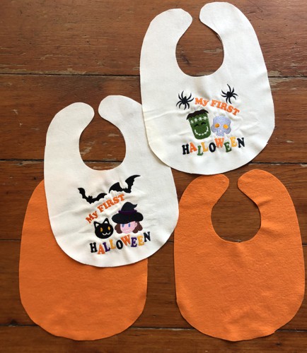 Embroidered fronts and 2 lining parts of the bibs.