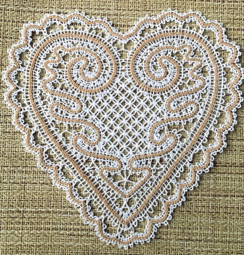 Finished doily with lace center.