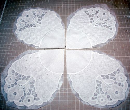 4 stitch-outs of the design placed in a circle.