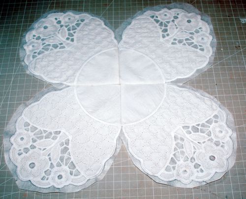 All parts stitched together in a doily.