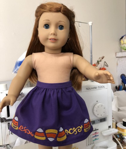 A skirt on the doll.